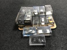 A tray of twenty James Bond die cast vehicles in plastic display cases