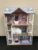 A KidKraft live and learn doll's house with accessories