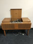 A mid-20th century teak cased HMV radiogram