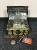 A GBC biscuit tin in the form of a trunk containing interesting collectables - Parker pen, inkwell,