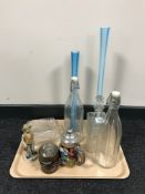 A tray of a pair of slender blue glass vases, decanter and stopper,