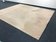 A large piece of beige carpet with underlay, 3.9 metres x 4.6 metres .