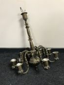 A decorative continental eight branch chandelier