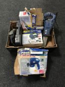 A box of assorted power tools,