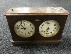 An oak cased pigeon clock