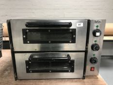 A Quattro stainless steel double table topped pizza oven