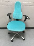 A contemporary Corrigo swivel office armchair