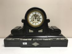 A Victorian slate mantle clock with gilt and enamel dial