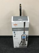 A boxed Vax power pet upright vac