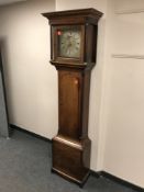 An early 19th century oak longcased clock with brass and silvered dial signed John Smallwood,