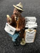 A Royal Doulton figure - Stop Press,