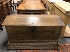 An early nineteenth century oak domed topped coffer