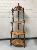 A Victorian inlaid rosewood four tier corner what not stand