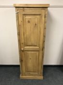 A reclaimed pine single door cupboard