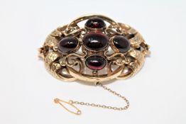 Large and impressive Victorian gold brooch set with cabochon garnets