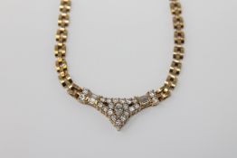 Fine quality 18ct necklace set with round baguette and marquise diamonds, approximately 1.8ct.