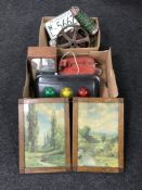 Two boxes containing a vintage metal wheel, oil can, traffic light box, desk stand, coffee grinder,