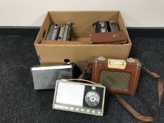 A box of nine vintage transistor radios
