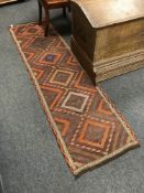 A Suzni carpet runner