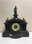 A Victorian slate mantle clock with gilt and enamel dial