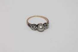 An antique 18ct gold pearl and diamond ring CONDITION REPORT: The ring is in good
