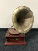 An HMV table topped gramophone with brass horn
