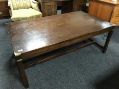 A mahogany brass bound coffee table