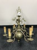 A continental brass six way chandelier