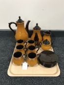 A sixteen-piece pottery coffee set