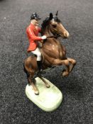 A Beswick figure - huntsman on a rearing horse, second version,