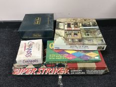 A quantity of assorted board games including Super Striker, Trivial Pursuit,