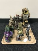 A tray of dragon ornaments and figures,