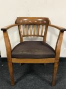 An oak captain's armchair