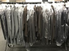 A rail of evening suit jackets - grey,