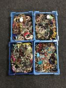 Four crates containing a very large quantity of costume jewellery to include bead necklaces,
