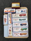 A tray of twelve boxed Dinky Atlas die cast vehicles