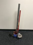 A Clark Strongarm Farm Jack (48 inches) together with an angle grinder