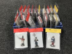 A basket of twenty Del Prado metal figures in packets