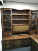 A mahogany bureau display cabinet fitted with cupboards and drawers beneath