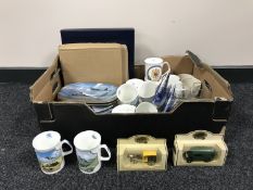 A box containing BradEx wall plaques depicting RAF planes,