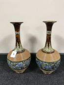 A pair of Royal Doulton Lambeth vases,