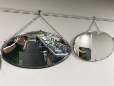 An early twentieth century chrome framed bevelled mirror together with an oval frameless mirror