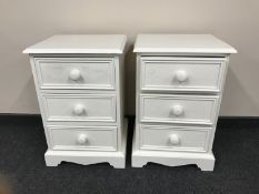 A pair of painted pine three drawer bedside chests CONDITION REPORT: These each
