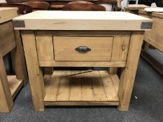A reclaimed pine butcher's block fitted with a drawer