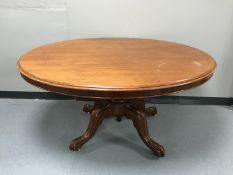 An oval Victorian mahogany pedestal breakfast table