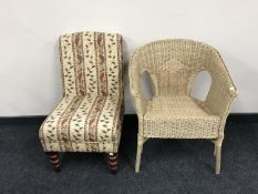 An Delcor bedroom chair together with a wicker conservatory armchair