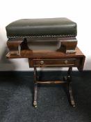 A mahogany sofa table together with a leather upholstered footstool