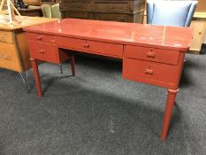 A mid 20th century painted writing desk fitted with five drawers