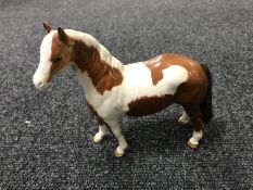 A Beswick horse - Pinto pony, model 1373, skewbald,