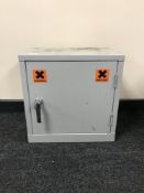 A metal lockable wall cabinet with key